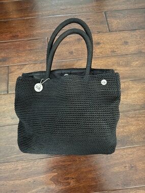 The Sak black crocheted small tote with cosmetic pouch